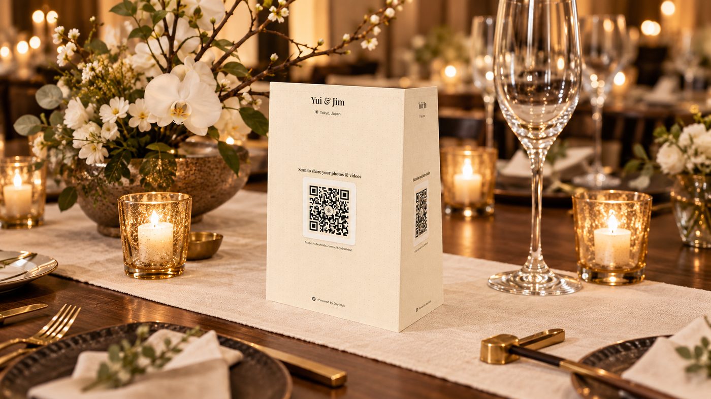 A printed Dayfolds table card with a QR code, folded and standing on a reception table